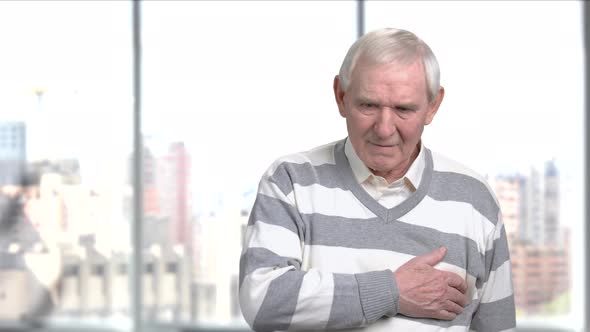 Aged Man Feels Pain in Chest. alt