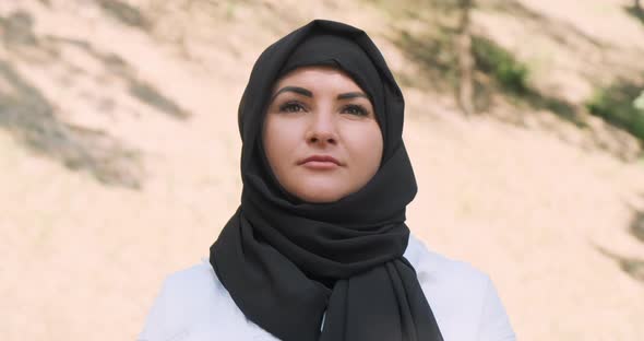 Modern Saudi Woman Portrait in Black Hijab Outdoors alt