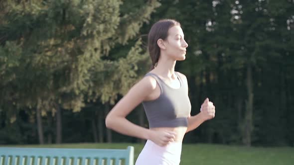 Woman jogging in the park.