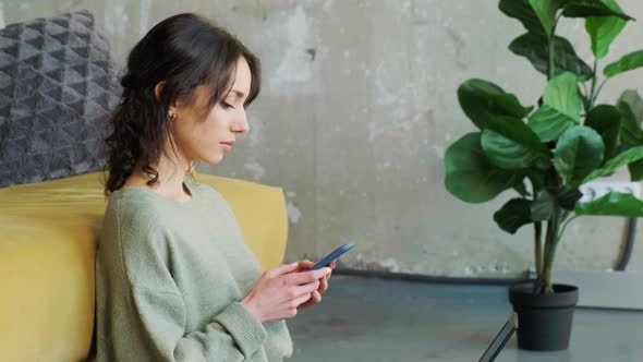 Woman Holding Smartphone and Type a Message Chating in Social Media alt