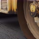 A Large Yellow Steamroller Flatten Hot Asphalt. Builds A New Road - VideoHive Item for Sale