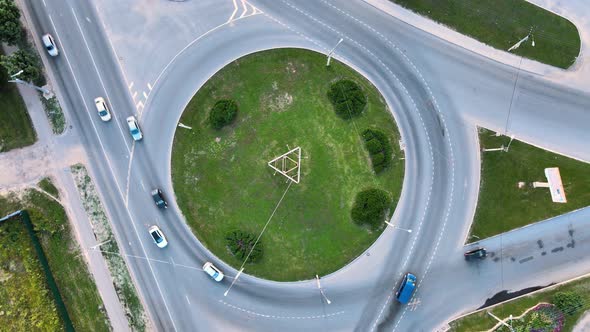 Drone video of urban elevated ring road overpass connecting two city districts alt