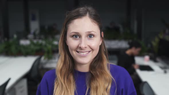 Happy Freelancer Woman Looking At Camera And Smiling