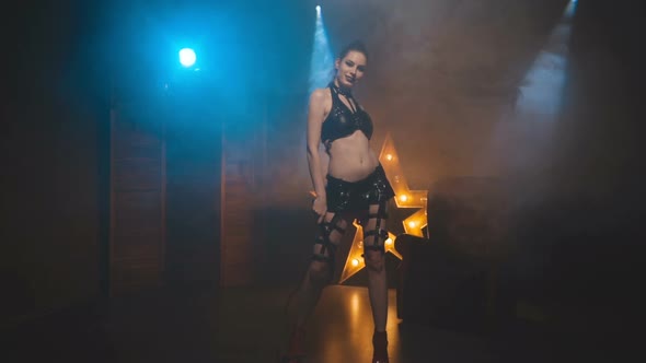 Beautiful Woman in Black Lingerie and Leather Belt Dominates alt