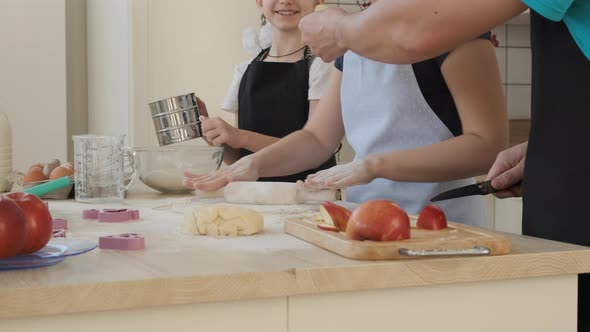 Family of Three Cooking Baking Cake or Cookies alt