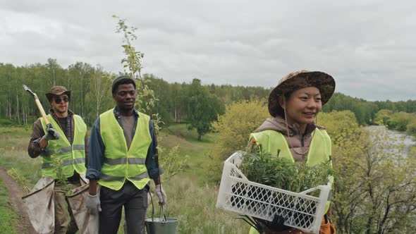 Farmers Carrying Seedlings alt