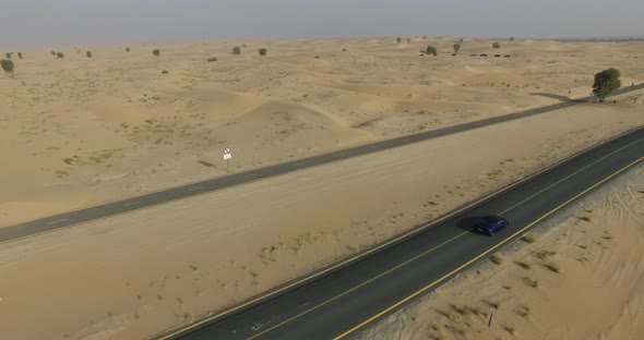 Sport Car on a Desert Highway