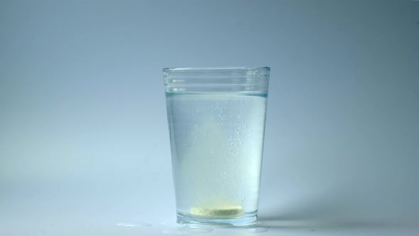 Medicine Melting In A Glass Of Water	 alt