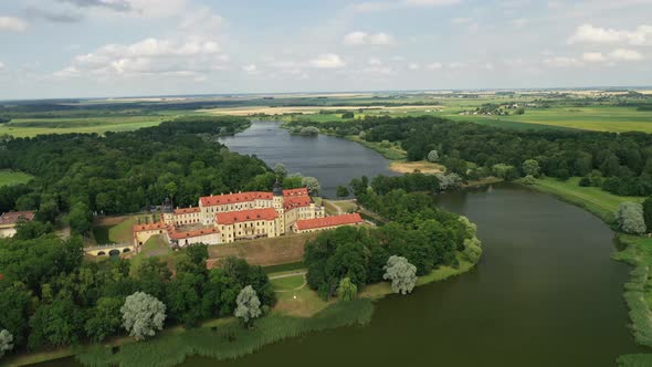 Flying Over the Nesvizh Castle, the Park Around the Castle and the Lake, Aerial Video of Nesvizh alt