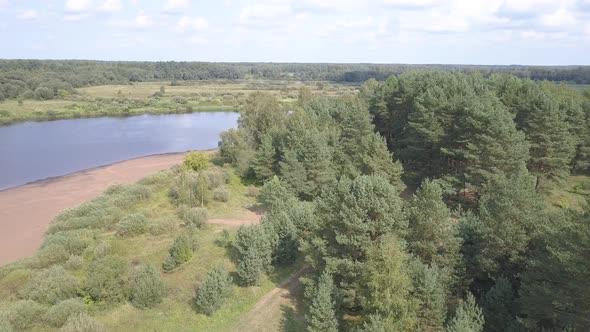 Forest, Wild Beach, Western Dvina River And Fisherman alt
