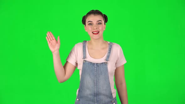 Young Woman Waving Hand and Showing Gesture Come Here. alt