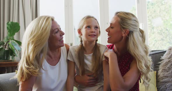 Caucasian woman spending time with her mother and her daughter alt