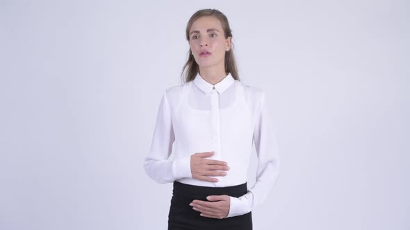 Young Beautiful Pregnant Businesswoman Thinking and Waiting alt