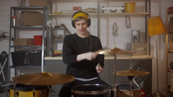 Young Man In Garage Studio alt