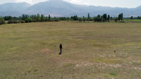 Man Walking In Countryside alt