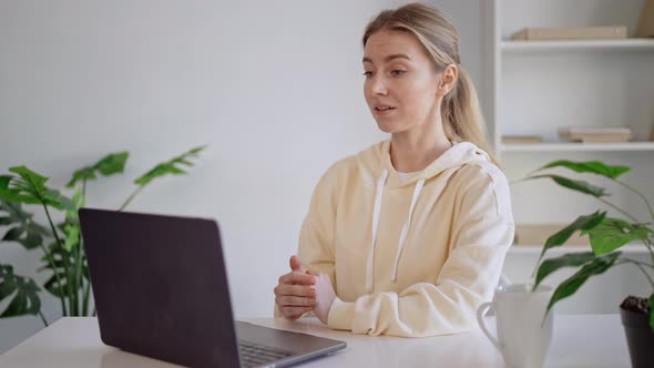 Freelancer Has Video Call at Workplace alt