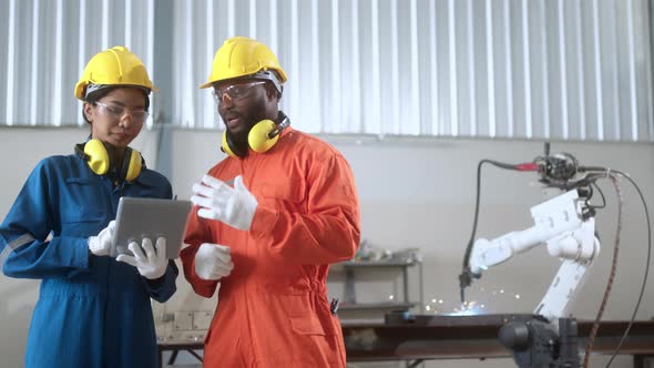 industrial 4.0 concept modern automated robot welding arm machine tool alt