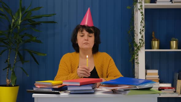 Middle Aged Businesswoman Celebrating Birthday Alone