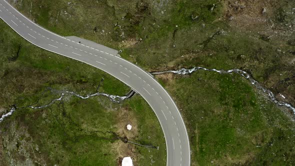 Aerial Top Down View of Empty Zigzag Road of Mountain Pass  Grossglockner Austria alt