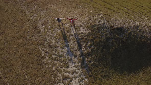 Drone view of two friends hiking in the Apennines, Umbria, Italy