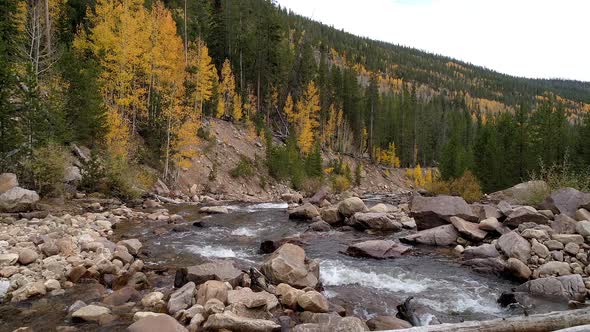 Flying low over the Provo River cascading down canyon in the Uinta Mountains alt