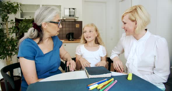 Grandmother with Daughters Talking at Home