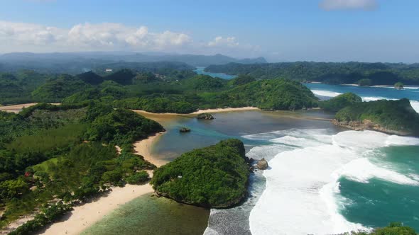 Idyllic landscape of Asmara beach, East Java coast, Indonesia, aerial ...