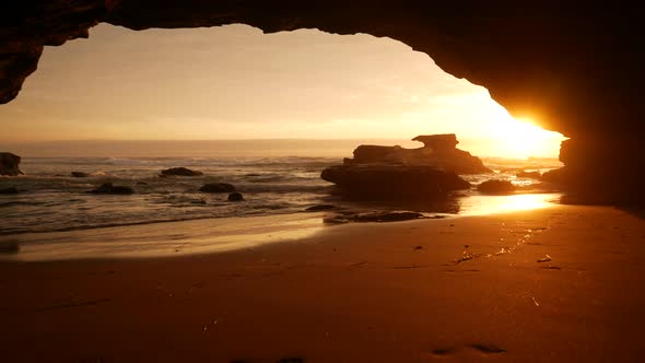 Sunrise in a Beach Cave