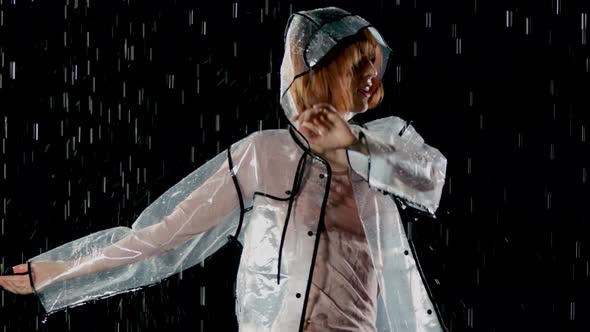 Beautiful Woman Dancing In The Rain alt