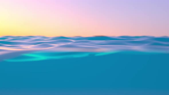 Blue Ocean Water Surface And Underwater With Sunset