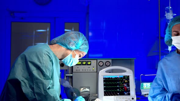 Surgeon Doing Surgery in Operating Room in Hospital