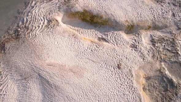 Wavy Limestone Textured Deposits on Terraces of Minerals alt
