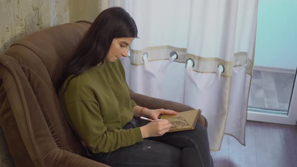 Young Woman Draws Making Sketch on Armchair Art Hobby Artist Painting