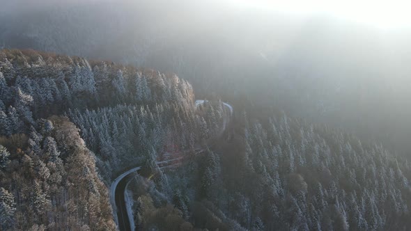 Aerial Drone Shot Over Famous Transfagaras Mountains Covered With Snow In Wintertime
