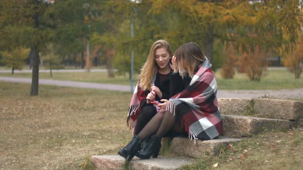 Two Girls in Autumn Park