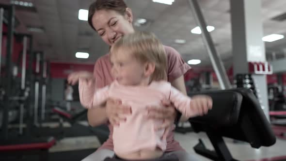 Baby with Mom in the Gym