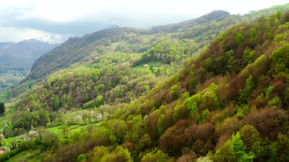 Aerial Video of the Small Town of Pasturo in Lombardy North Italy Showing Mountain Panorama Forest alt