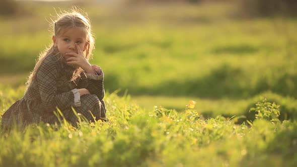 Girl Lonely in Grass Field