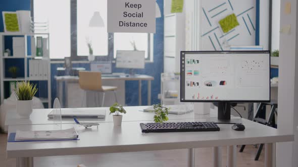 Financial Business Graphs in Empty Office with Nobody in It alt