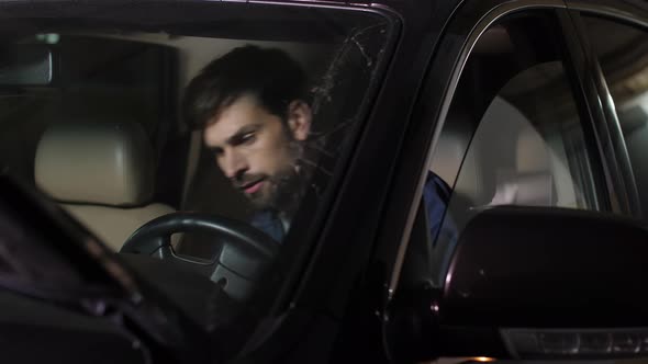 Auto Repair Specialist Checking Car Start System alt