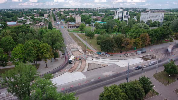Road Construction Site with Tram Tracks Repair and Maintenance Aerial Timelapse alt