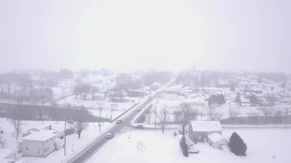 Drone Footage Flying In A Blizzard Over A Small Town, Stock Footage