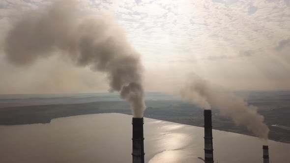 Aerial View of High Chimney Pipes with Grey Smoke From Coal Power Plant alt