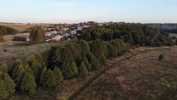 Village Outskirts On A Hillside