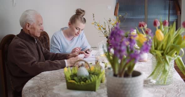 Happy Easter - Woman and Senior Man Talking During Easter Holidays alt