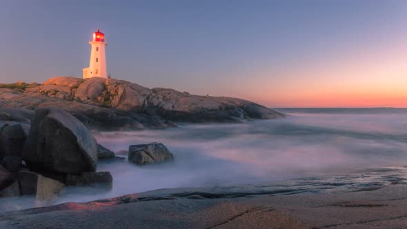 A dreamy evening at Peggy's Cove Lighthouse at dusk Nova Scotia Canada alt