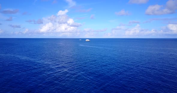 Wide angle fly over tourism shot of a sunshine white sandy paradise beach and aqua turquoise water b alt