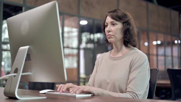 Creative Senior Woman Leaving Workplace alt