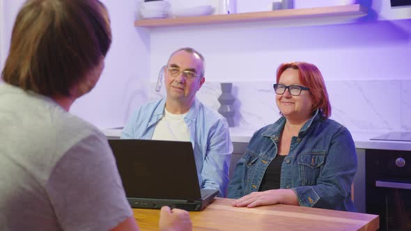 Insurer Man Presents Offer Medical Insurance Services to Aged Spouses Concept alt