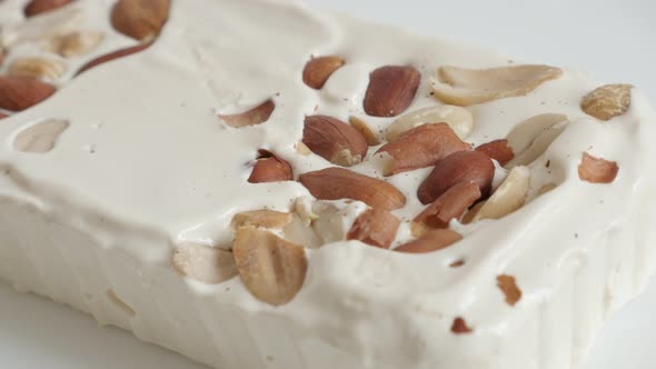 Halva nougat with almonds  4K close-up footage alt